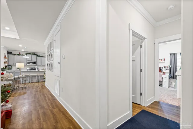 a view of a kitchen from the hallway