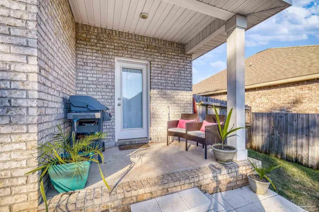 a backyard of a house with seating space
