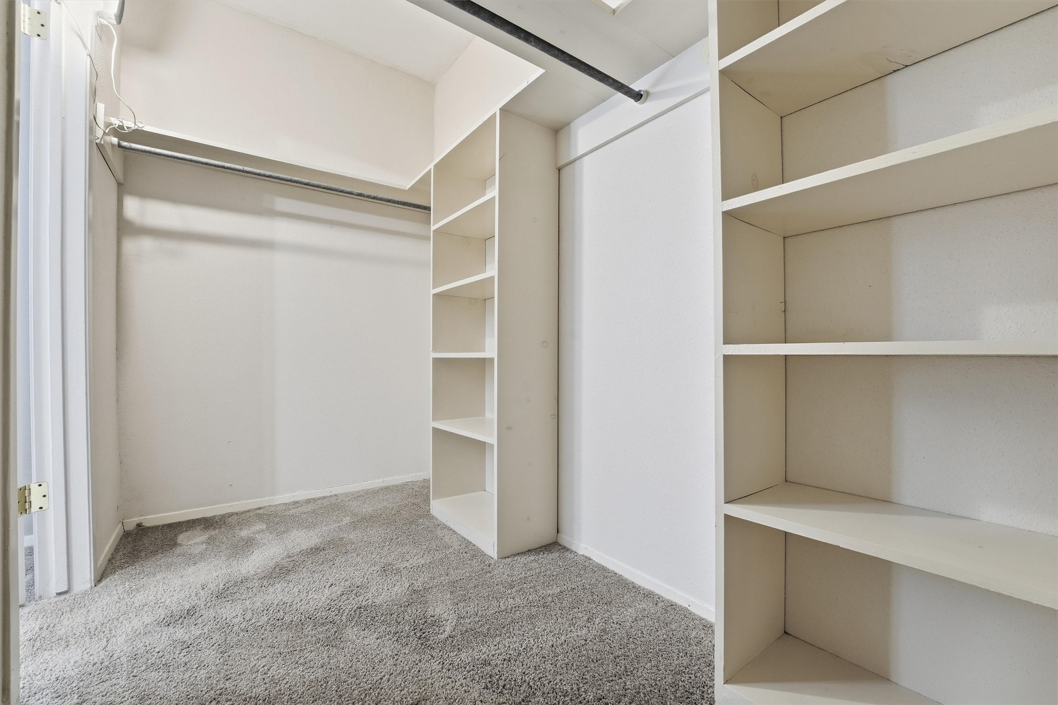 2232 South Piney Point Road, Unit 108 Houston, TX 77063 - Photo 17 of 32 a view of an empty walk in closet