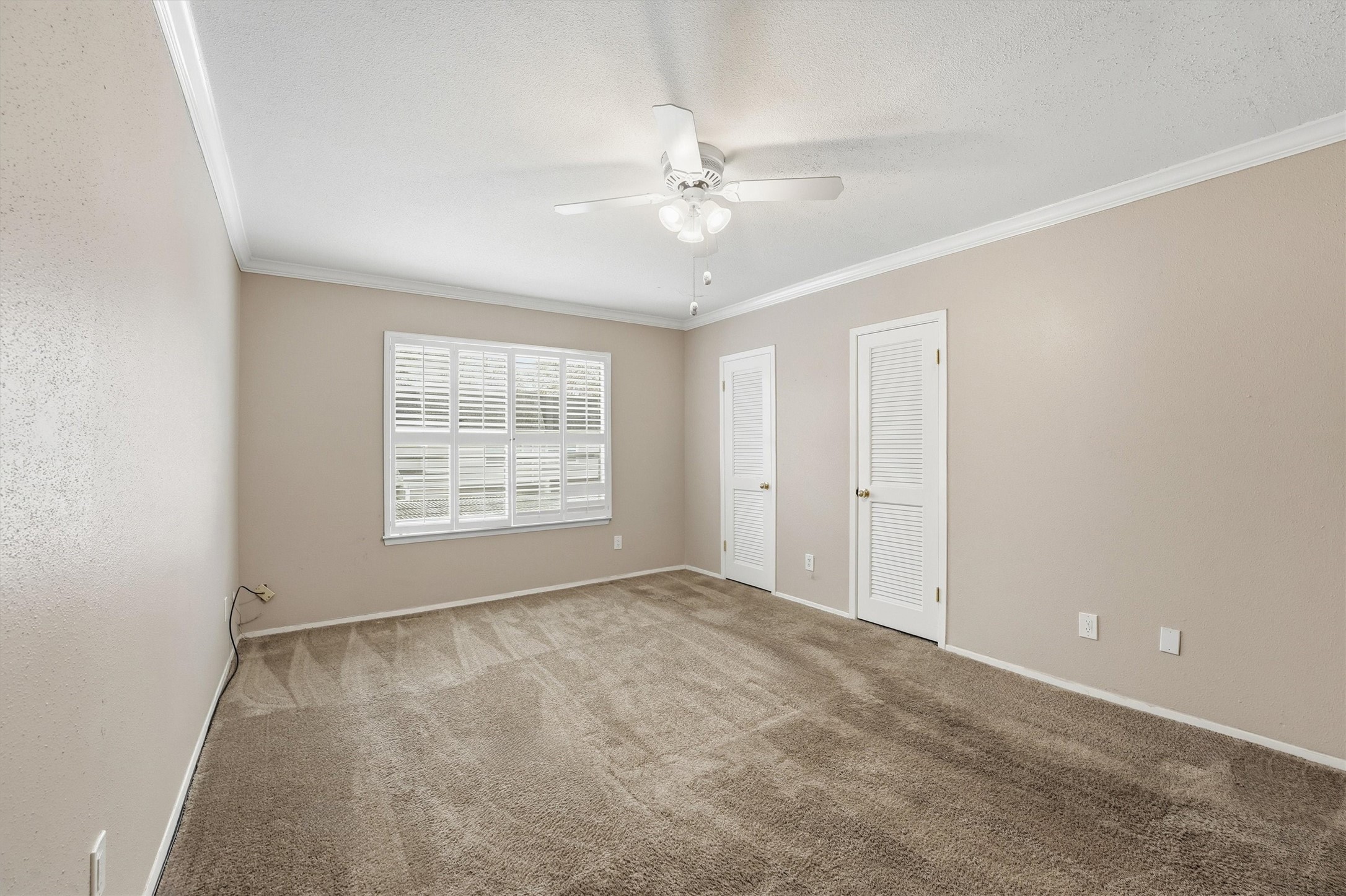 2232 South Piney Point Road, Unit 108 Houston, TX 77063 - Photo 19 of 32 a view of an empty room with a window