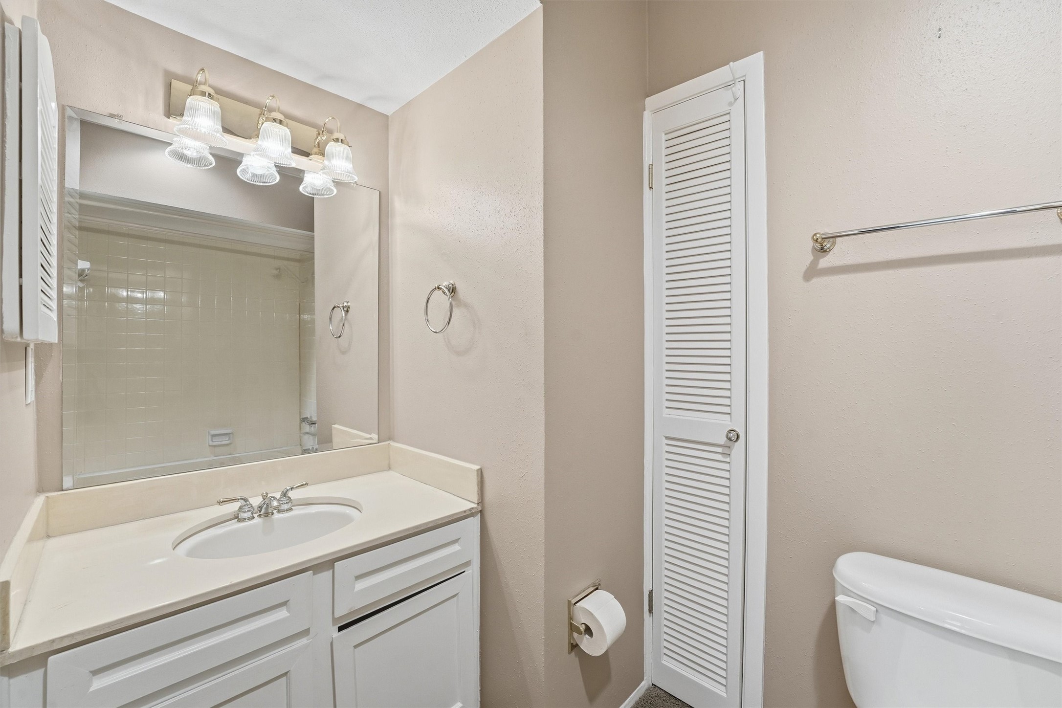 2232 South Piney Point Road, Unit 108 Houston, TX 77063 - Photo 20 of 32 a bathroom with a granite countertop sink toilet and shower