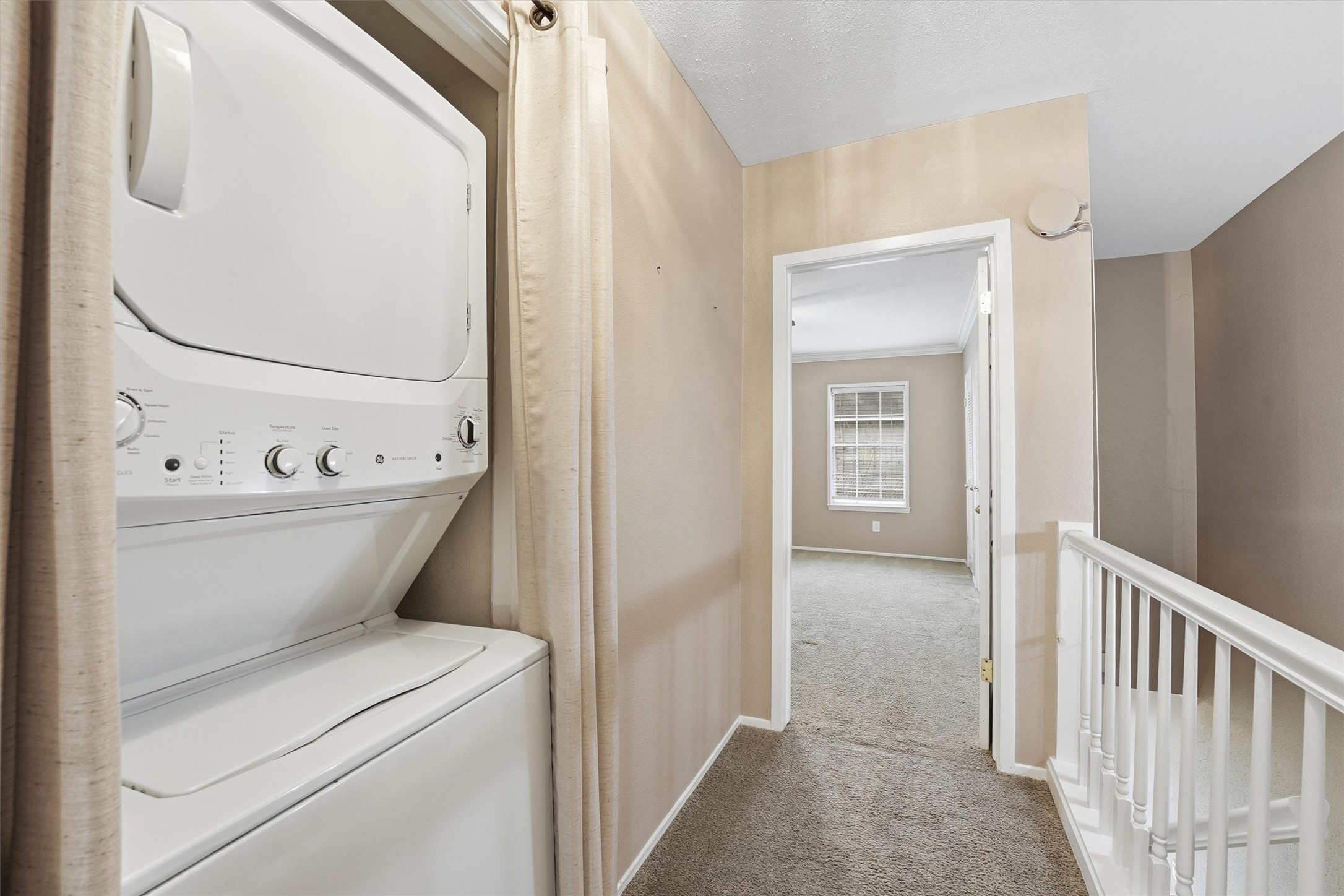 2232 South Piney Point Road, Unit 108 Houston, TX 77063 - Photo 21 of 32 a view of washer and dryer