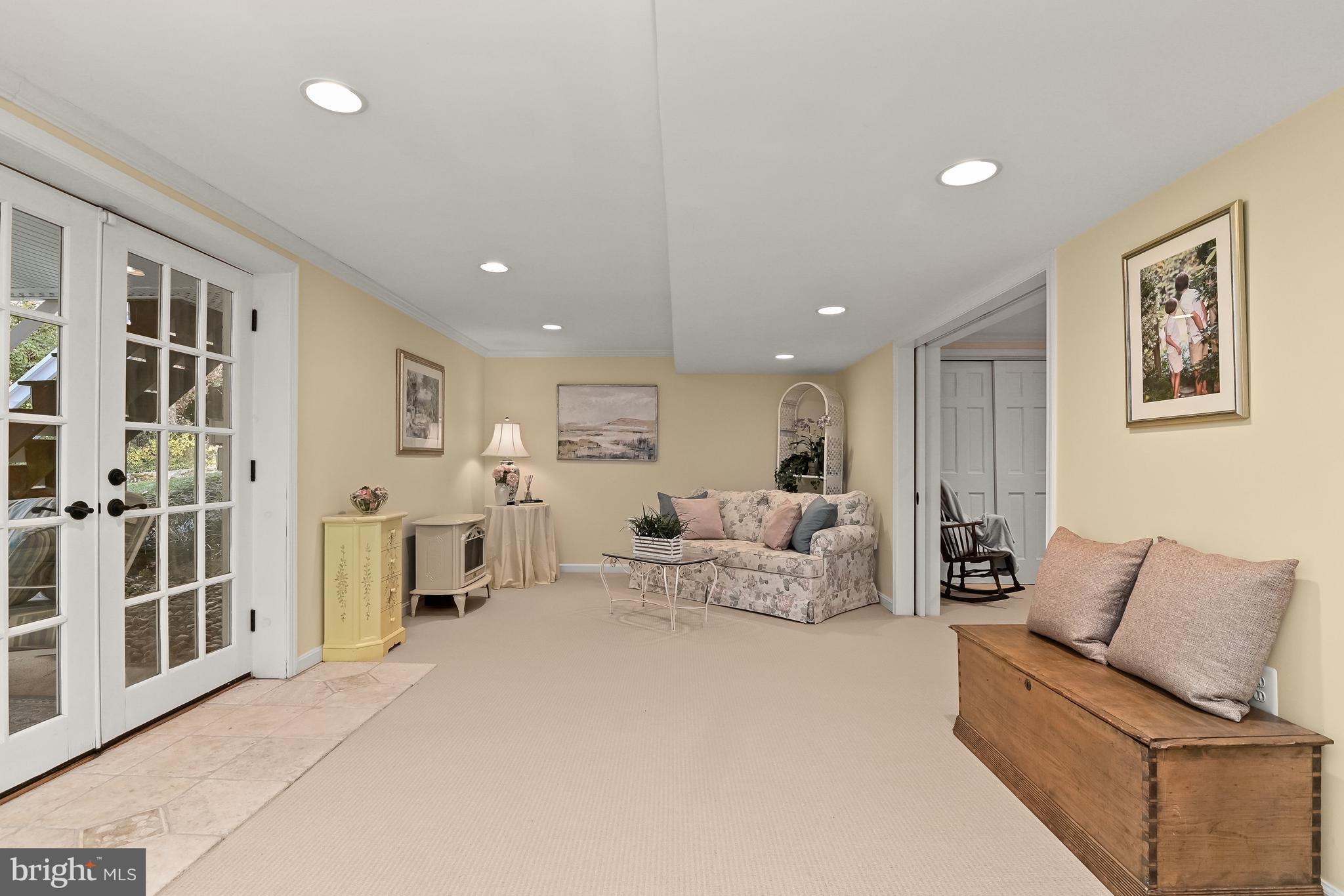 11700 Beekman Place Potomac, MD 20854 - Photo 29 of 44 Lower Level Recreation Room with French Doors lead