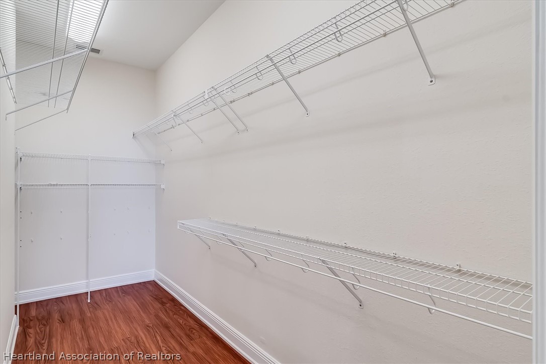 5224 Haw Branch Road Sebring, FL 33875 - Photo 23 of 40 a view of a room with racks on the wall