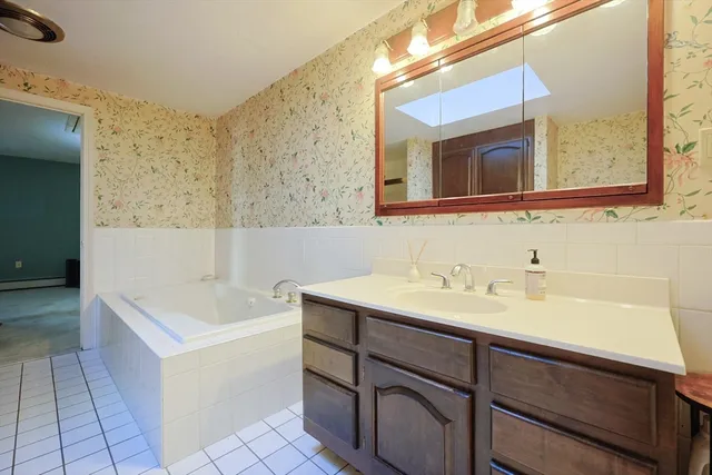 a bathroom with a sink and a bathtub