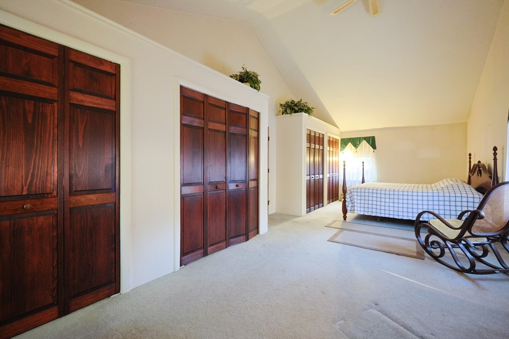 587 Common Street Walpole, MA 02081 - Photo 32 of 38 a living room with furniture
