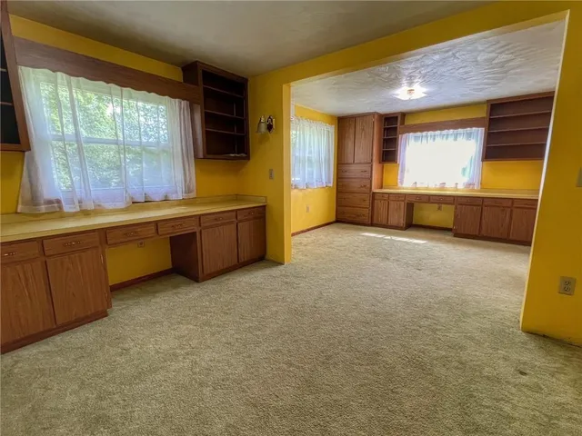 a room with furniture and window