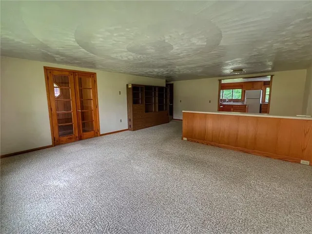 an empty room with windows