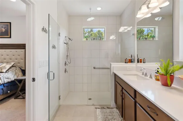 a view of a patio with table and chairs and potted plants