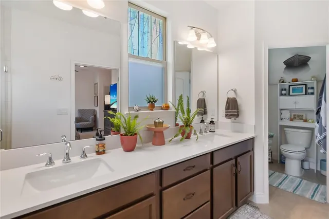 a backyard of a house with yard barbeque oven and outdoor seating