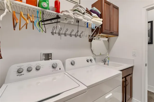 a view of a building with traffic signal lights