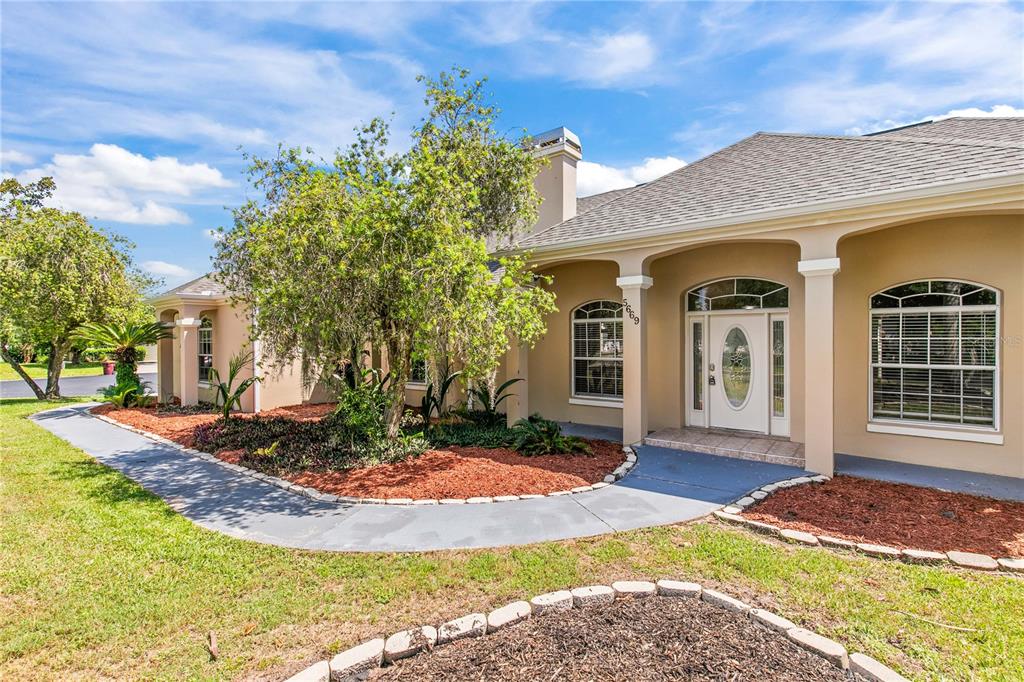 5669 Merlin Way St. Cloud, FL 34772 - Photo 2 of 30