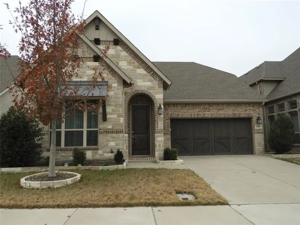 a front view of a house with entertaining space