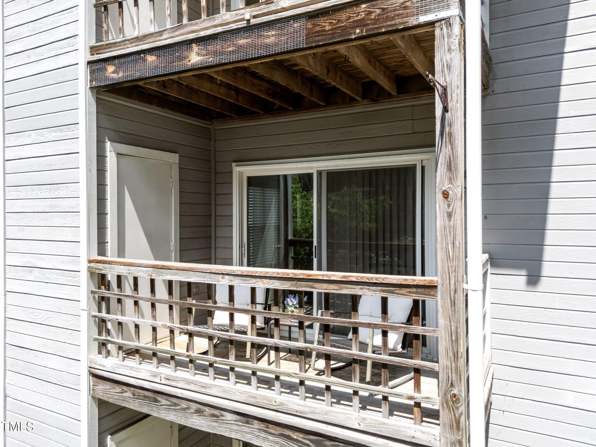 4611 Timbermill Court, Unit 201 Raleigh, NC 27612 - Photo 13 of 32 a front view of a house with a window
