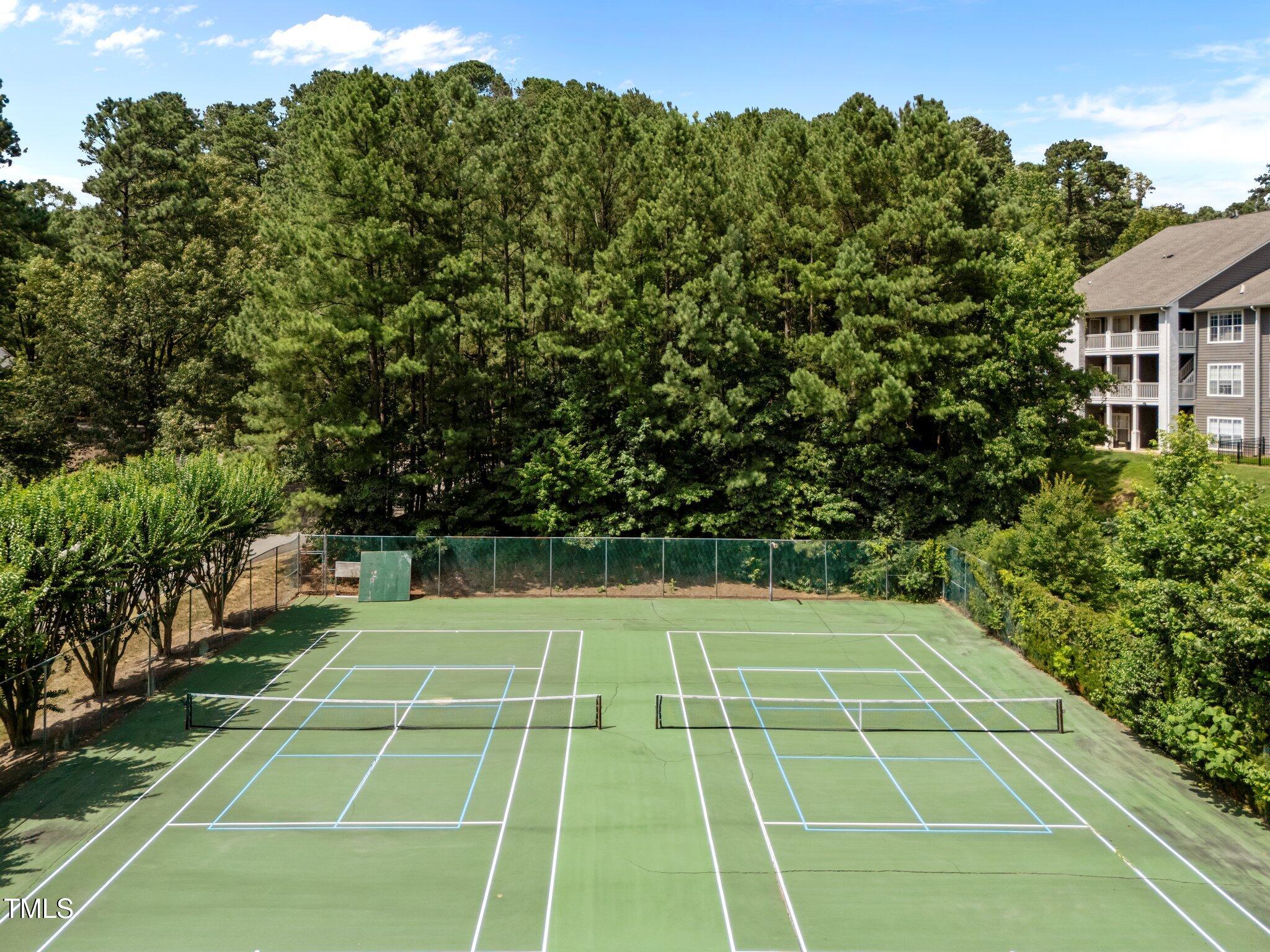 4611 Timbermill Court, Unit 201 Raleigh, NC 27612 - Photo 32 of 32 a view of a tennis court