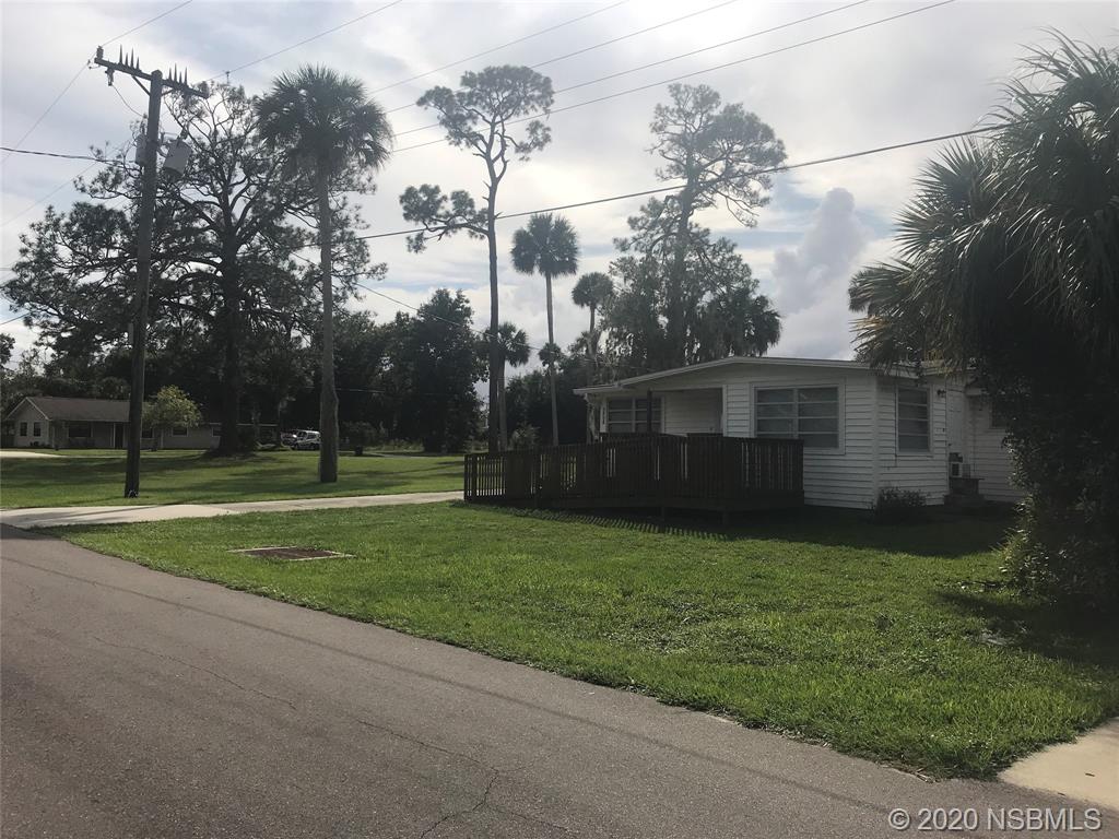204 Hubbell Street Edgewater, FL 32132 - Photo 14 of 14 a view of a house with a backyard