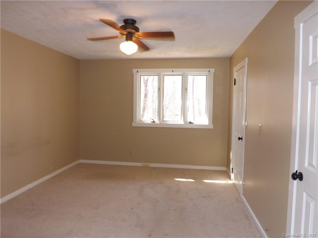 6019 Davis Road Waxhaw, NC 28173 - Photo 16 of 19 a view of an empty room with a window