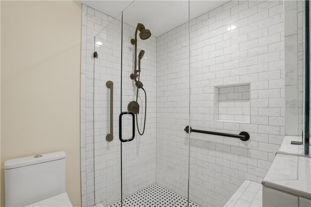 3777 Peachtree Road Northeast, Unit 932 Brookhaven, GA 30319 - Photo 19 of 26 a bathroom with a shower