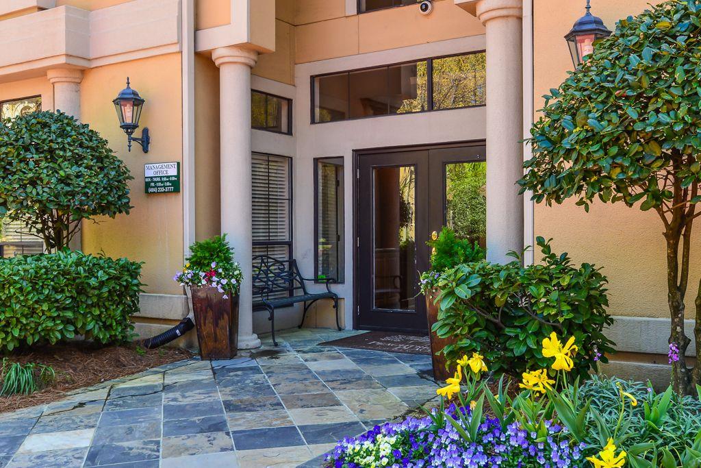 3777 Peachtree Road Northeast, Unit 932 Brookhaven, GA 30319 - Photo 25 of 26 a view of a house with potted plants