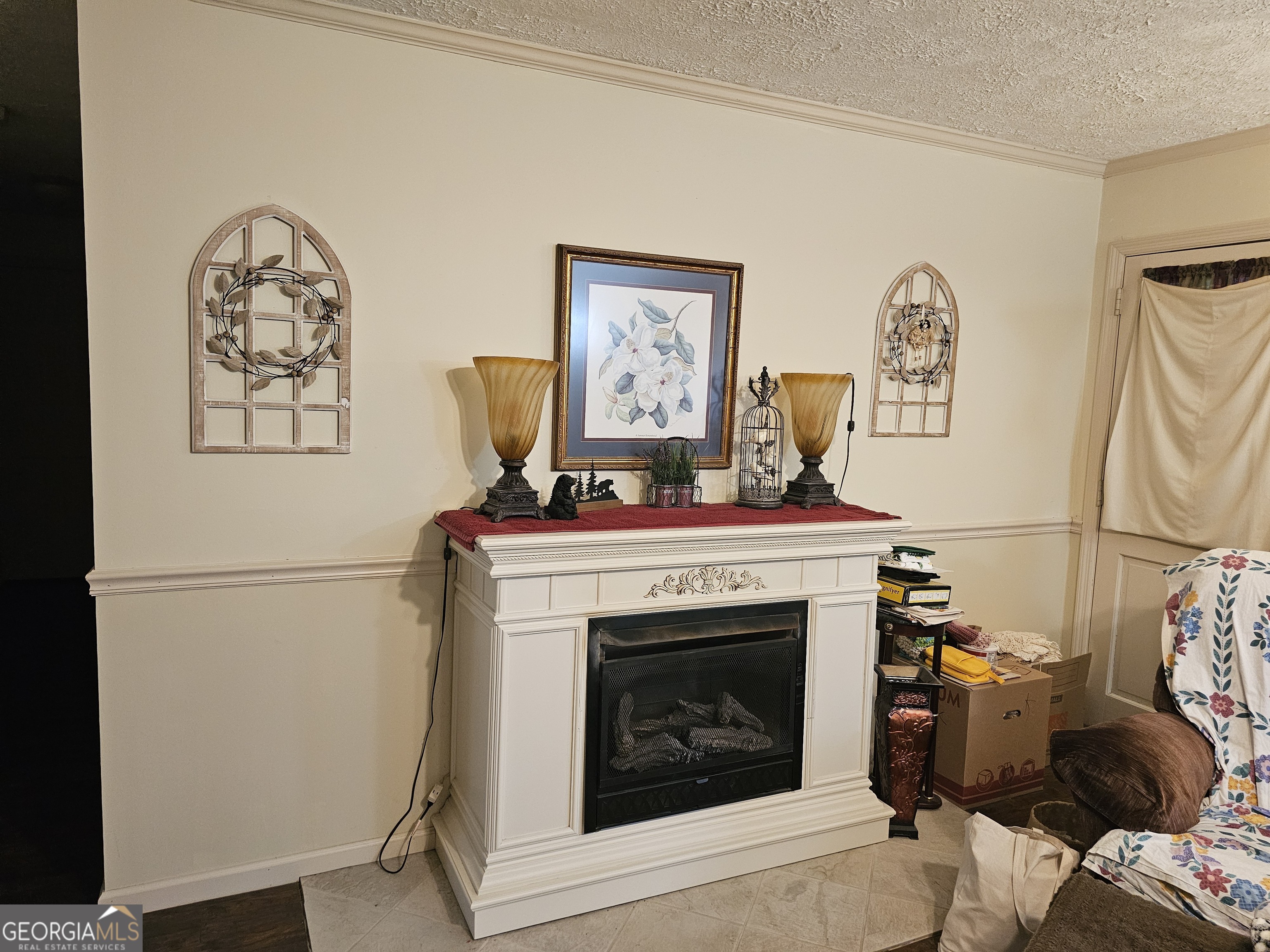 613 Old Macon Road Dublin, GA 31021 - Photo 5 of 17 a view of a livingroom with furniture and a fireplace