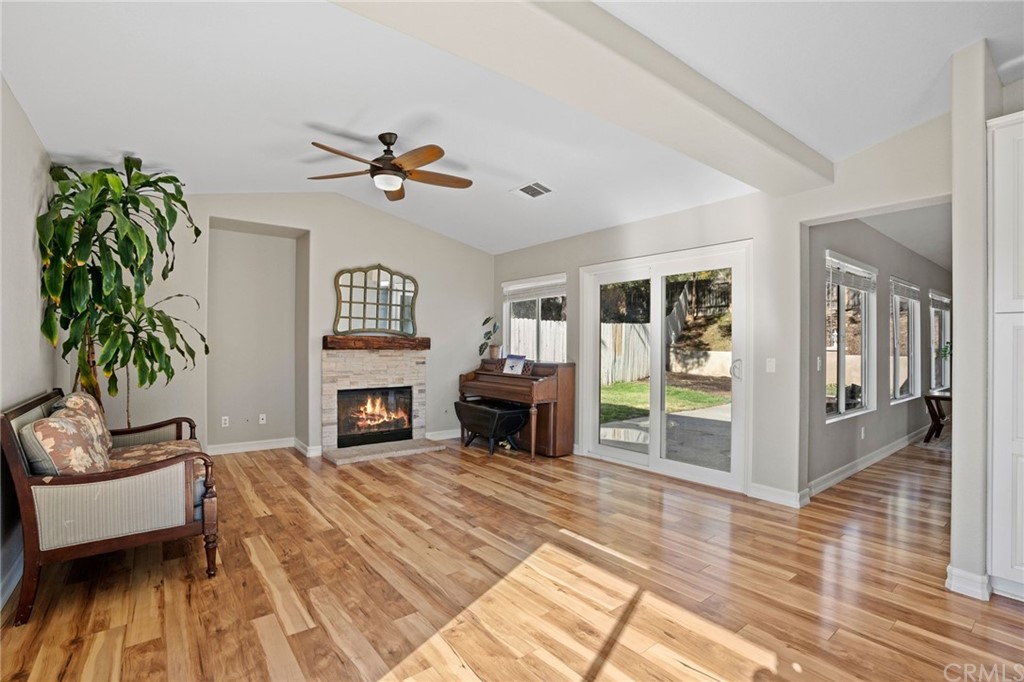 43345 Via Sabino Temecula, CA 92592 - Photo 12 of 22 a living room with furniture and a fireplace