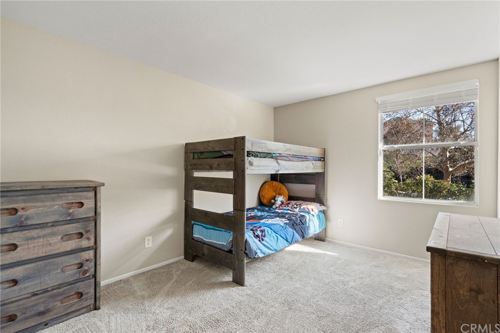 43345 Via Sabino Temecula, CA 92592 - Photo 17 of 22 a room with furniture and a window