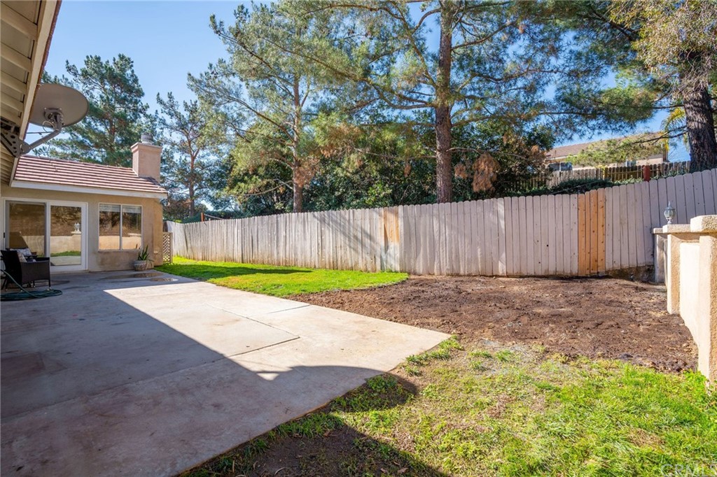 43345 Via Sabino Temecula, CA 92592 - Photo 22 of 22 a view of back yard of house with wooden fence