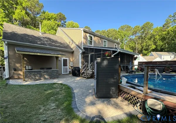 a view of house with outdoor space