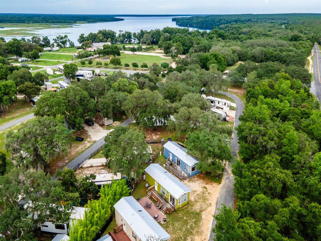 15991 Northeast 243rd Place Road, Unit 32 Fort McCoy, FL 32134 - Photo 20 of 27 an aerial view of a house with outdoor space and street view