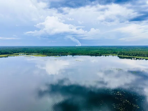 a view of a lake with outdoor space