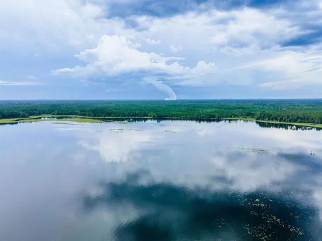 a view of a lake with outdoor space