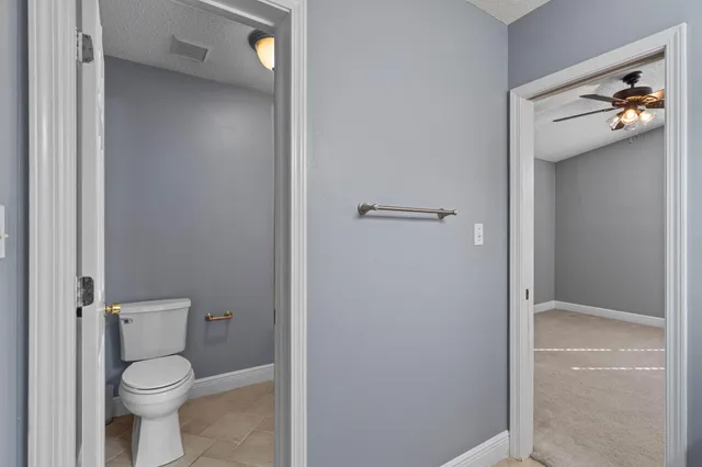 a bathroom with a toilet