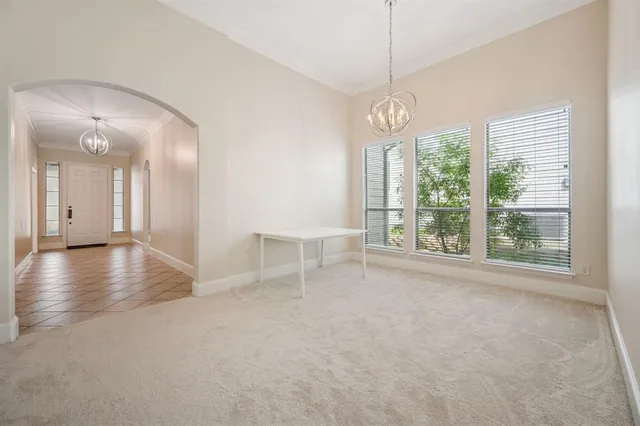 a view of a livingroom with a furniture window and wooden floor
