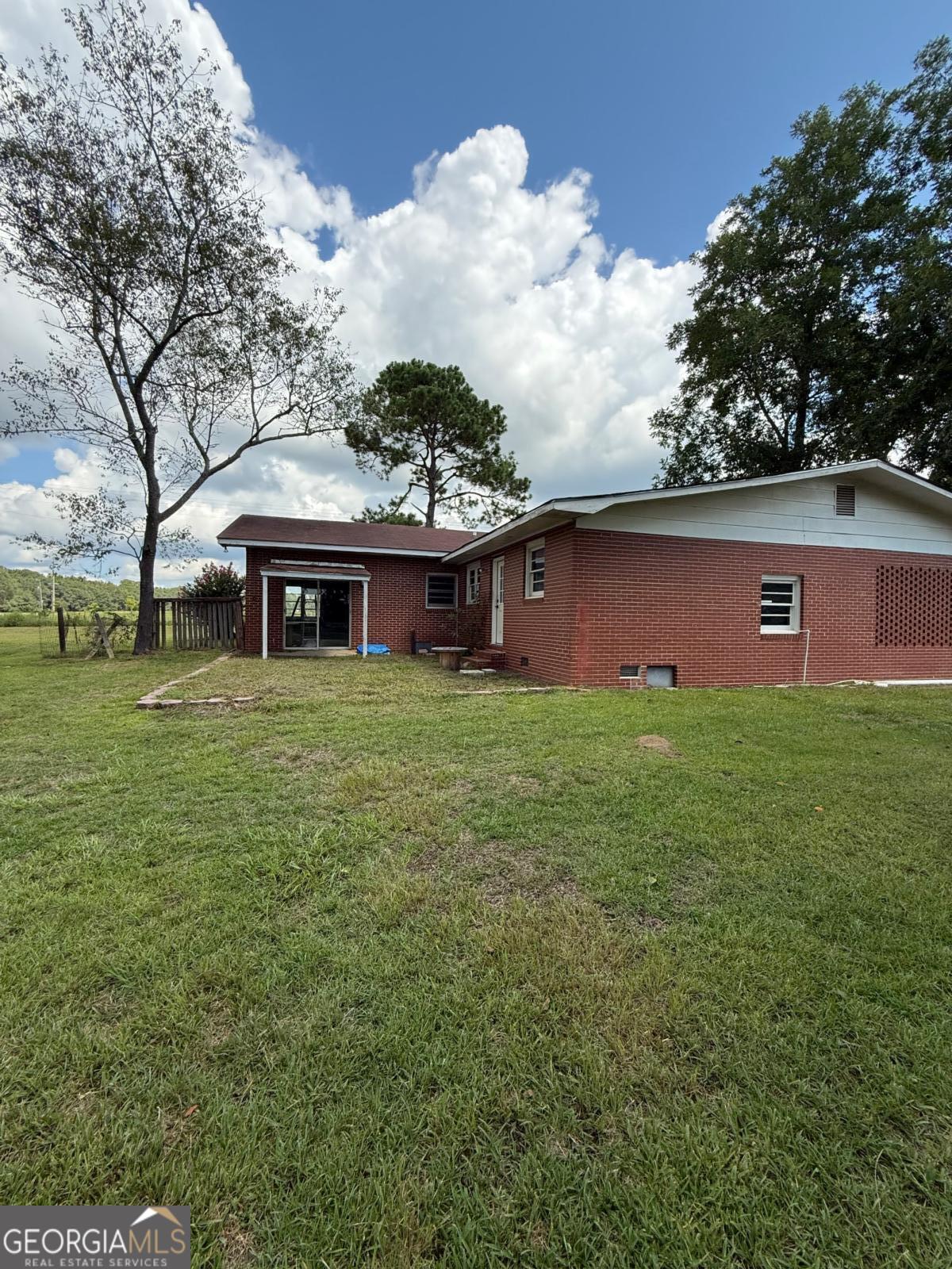 221 Rentz Bridge Road Lenox, GA 31637 - Photo 12 of 19 a view of a house with a yard