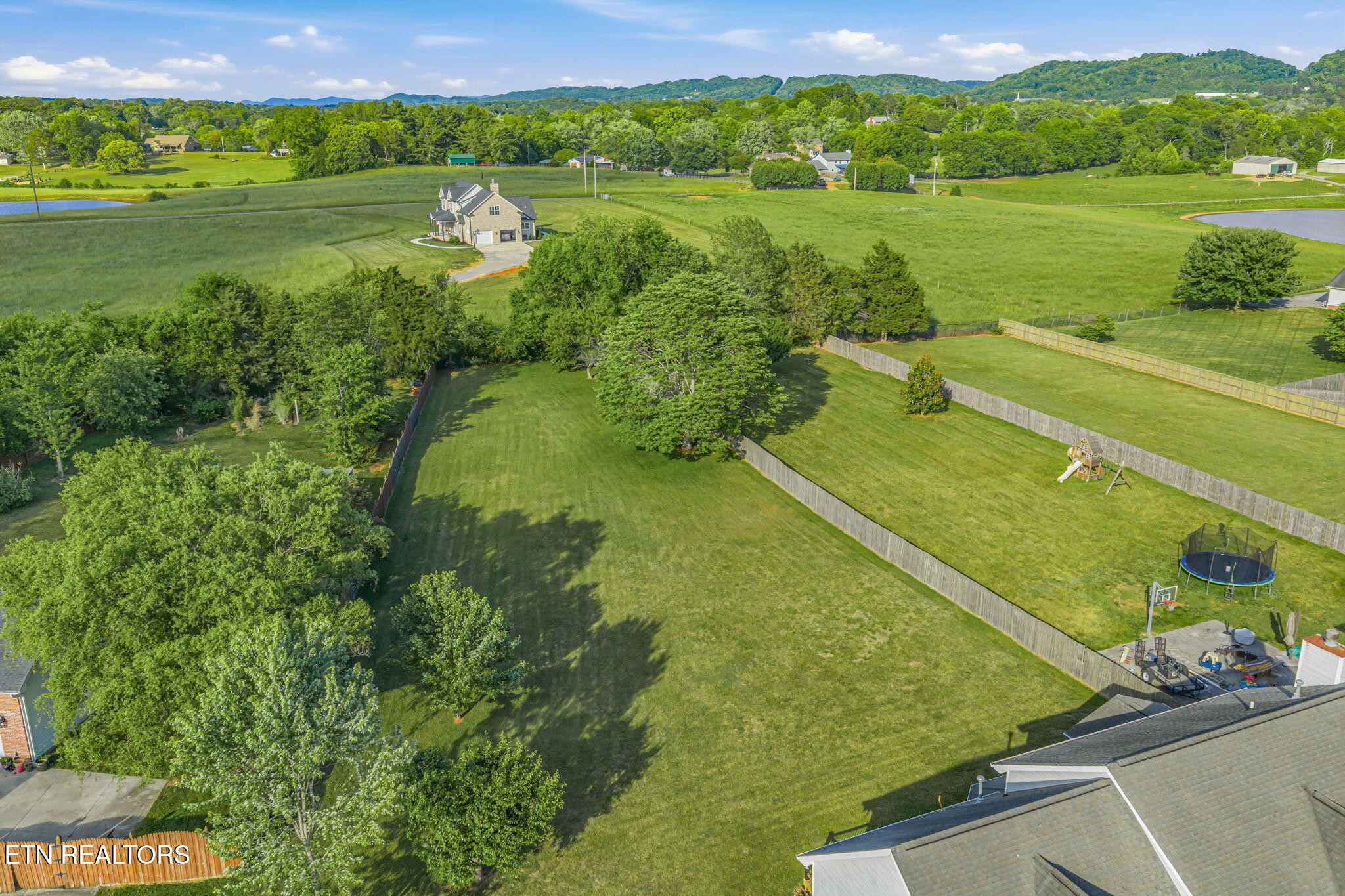 7030 Westerly Winds Road Knoxville, TN 37931 - Photo 38 of 40 a view of a field with an ocean