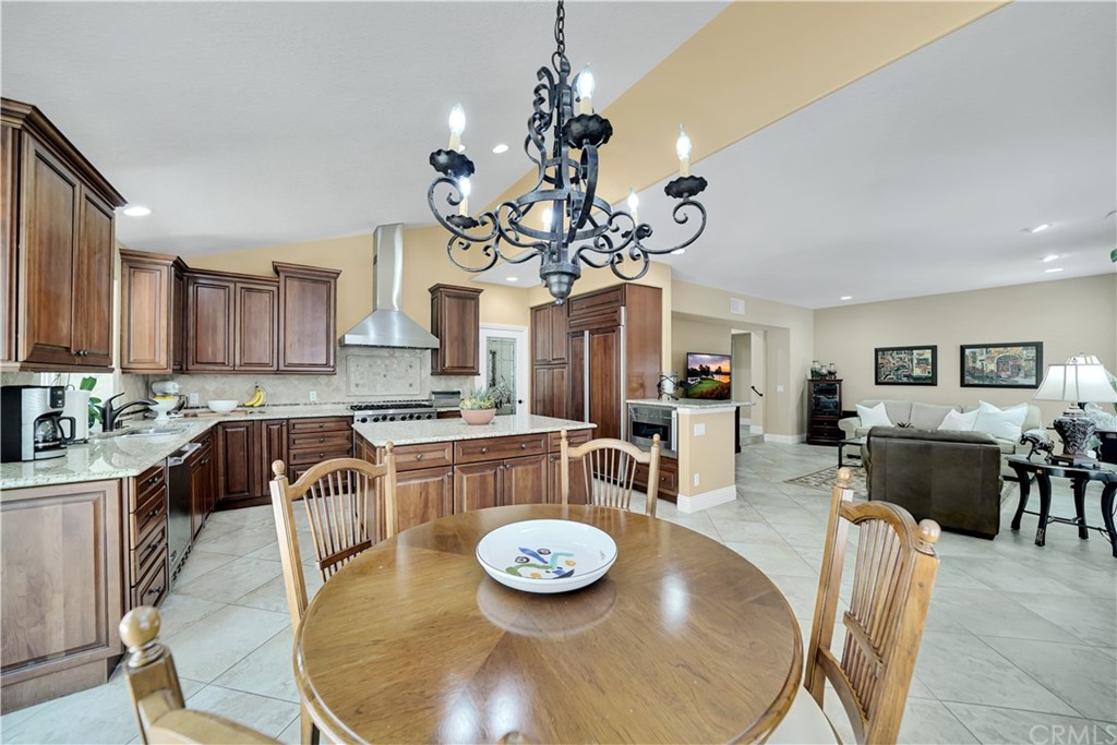 19 Springbrook Road Laguna Niguel, CA 92677 - Photo 12 of 41 a kitchen with dining table and chairs
