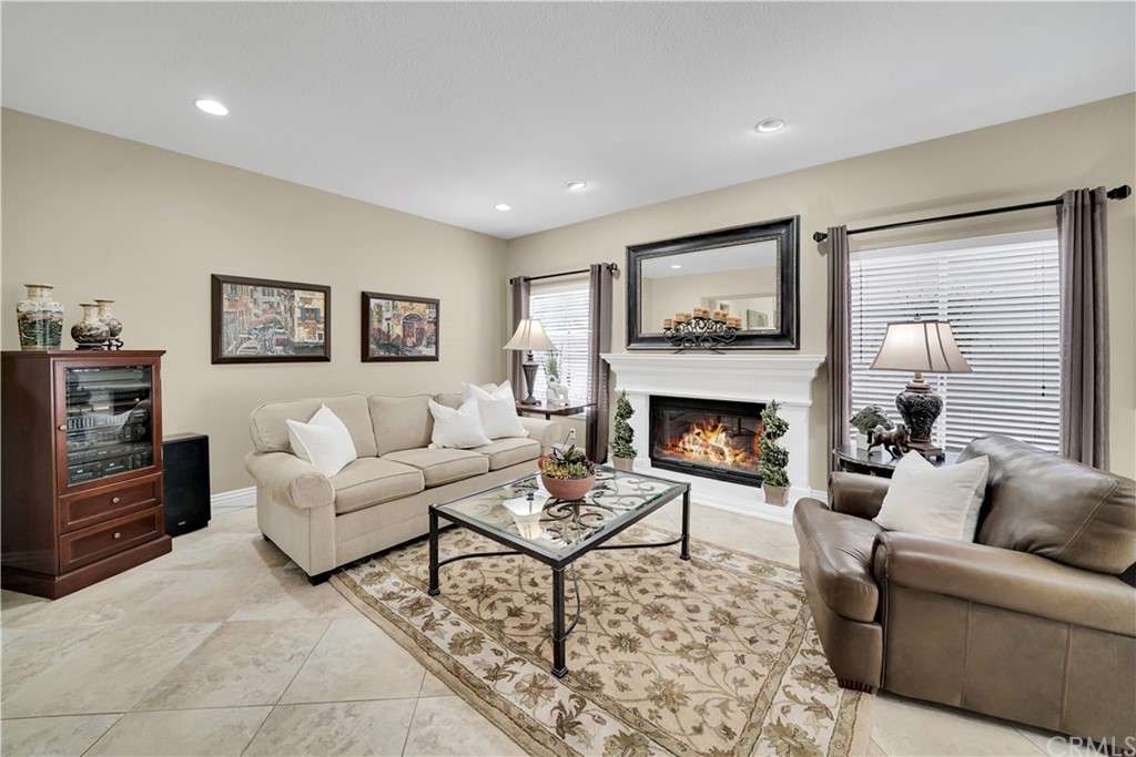 19 Springbrook Road Laguna Niguel, CA 92677 - Photo 15 of 41 a living room with furniture and a fireplace