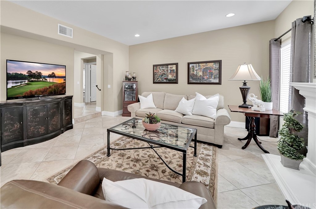 19 Springbrook Road Laguna Niguel, CA 92677 - Photo 16 of 41 a living room with furniture and a flat screen tv