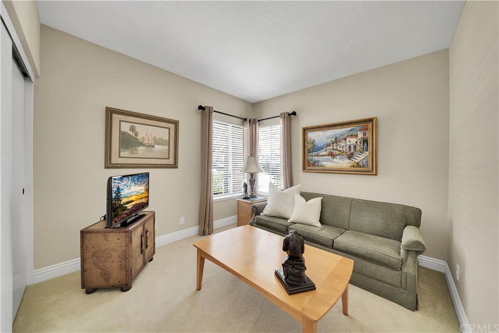 19 Springbrook Road Laguna Niguel, CA 92677 - Photo 18 of 41 a living room with furniture and a window
