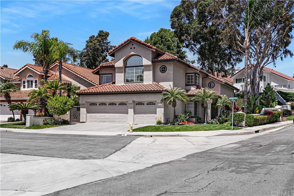 19 Springbrook Road Laguna Niguel, CA 92677 - Photo 2 of 41 a front view of a house with a yard