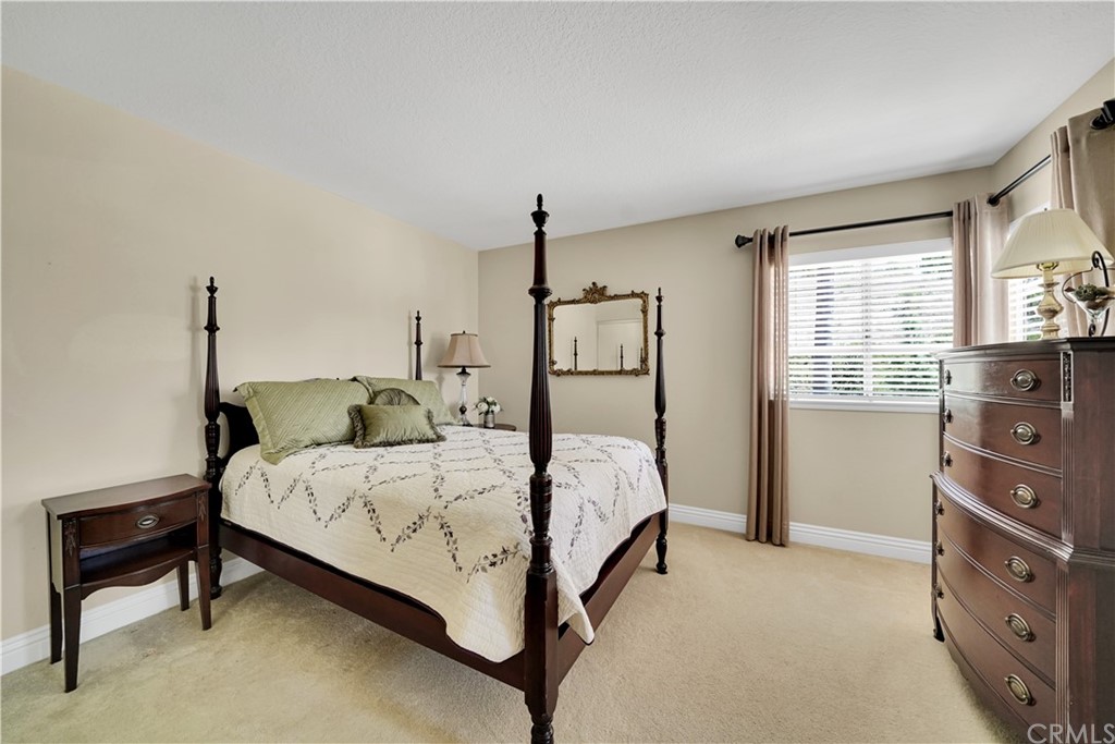 19 Springbrook Road Laguna Niguel, CA 92677 - Photo 24 of 41 a bedroom with a bed and a dresser