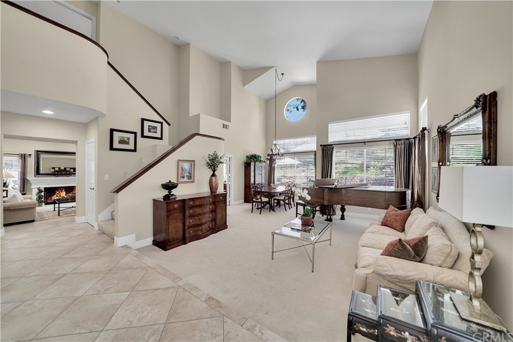 19 Springbrook Road Laguna Niguel, CA 92677 - Photo 4 of 41 a living room with furniture and a flat screen tv