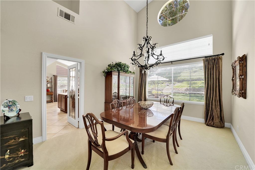 19 Springbrook Road Laguna Niguel, CA 92677 - Photo 7 of 41 a view of a dining room with furniture window and outside view