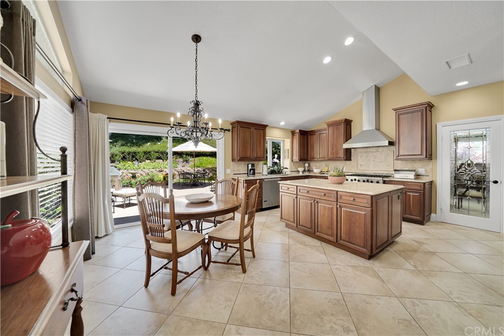 19 Springbrook Road Laguna Niguel, CA 92677 - Photo 10 of 41 a kitchen with kitchen island counter top space appliances and cabinets