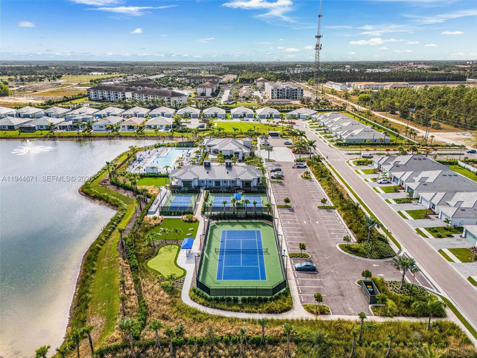 9087 Kite Lane Naples, FL 34114 - Photo 2 of 36 an aerial view of residential houses with outdoor space