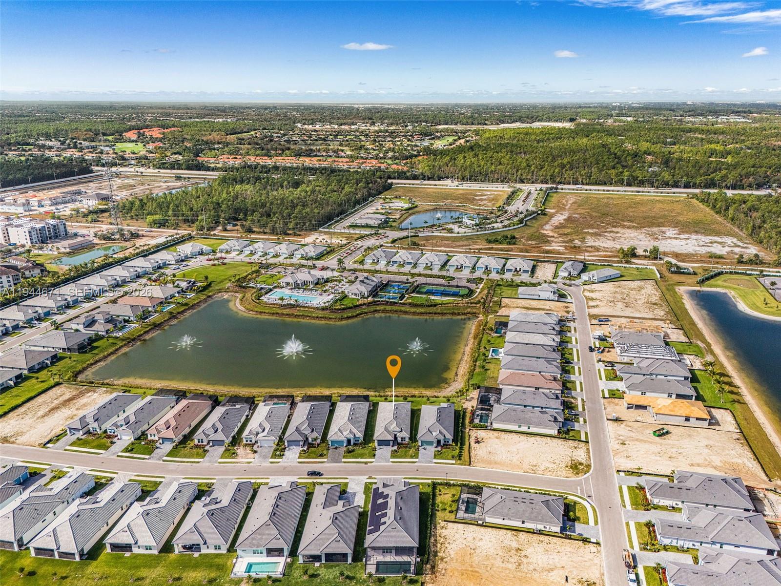 9087 Kite Lane Naples, FL 34114 - Photo 6 of 36 a view of a city with an ocean