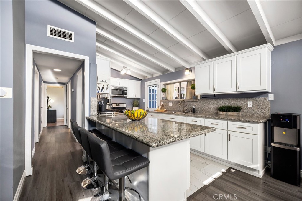 533 South Devon Road Orange, CA 92868 - Photo 4 of 44 Kitchen with exposed wood beams