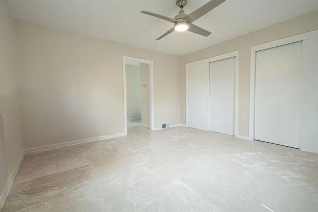 an empty room with windows