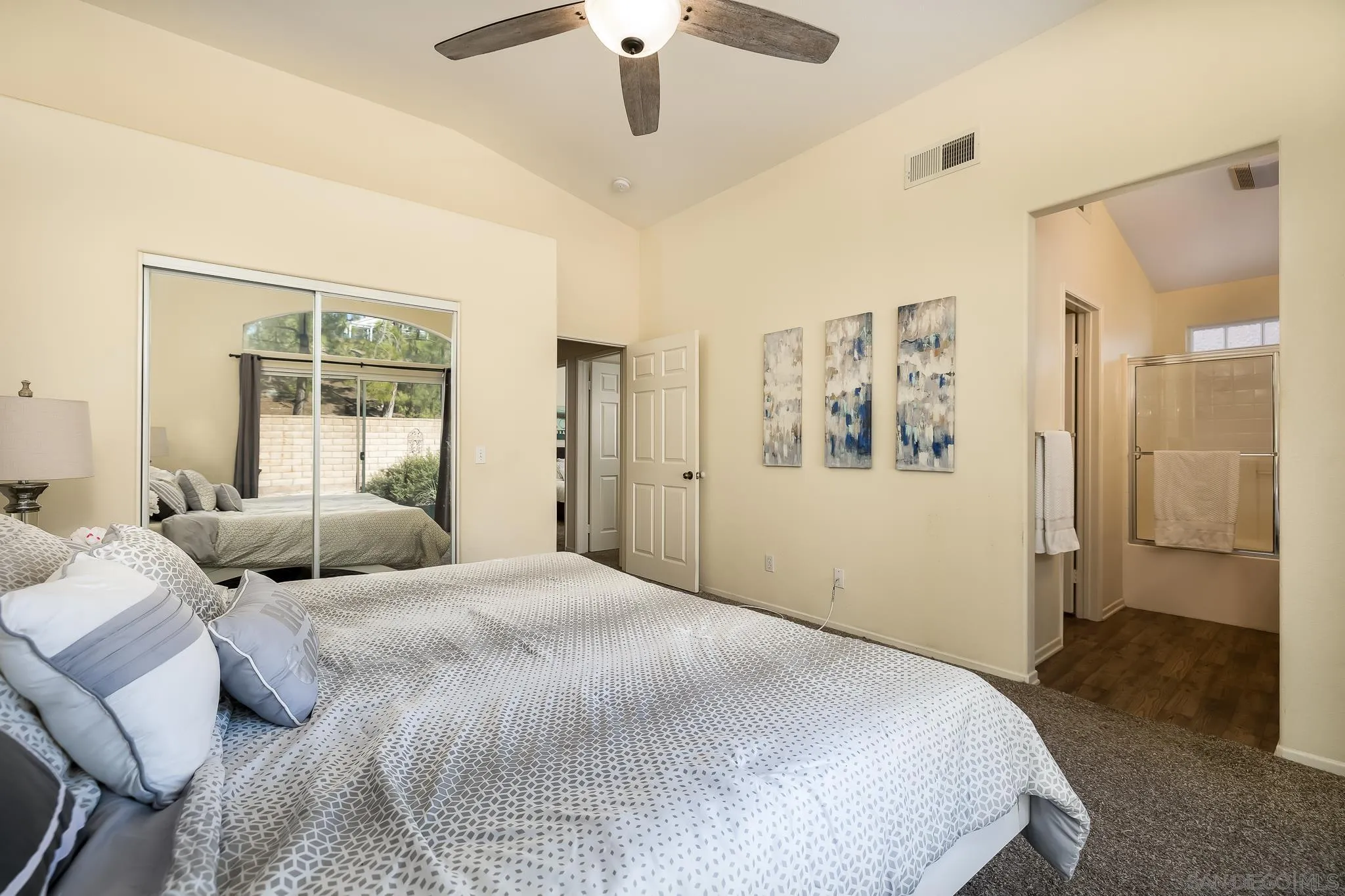 2344 Hyacinth Road Alpine, CA 91901 - Photo 12 of 29 a bedroom with a large bed and a window