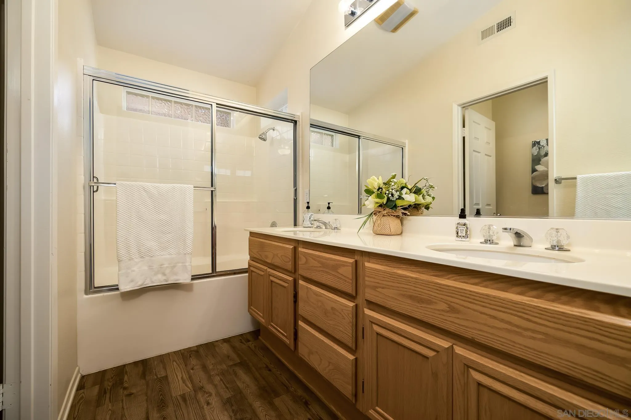 2344 Hyacinth Road Alpine, CA 91901 - Photo 13 of 29 a bathroom with a double vanity sink and a mirror